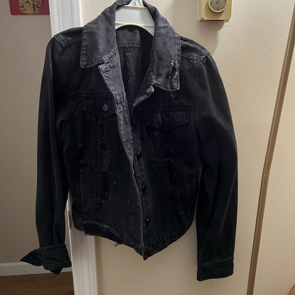 Distressed black jean jacket